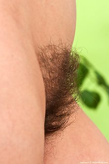Busty mature lifts off dress unveiling very hairy bush